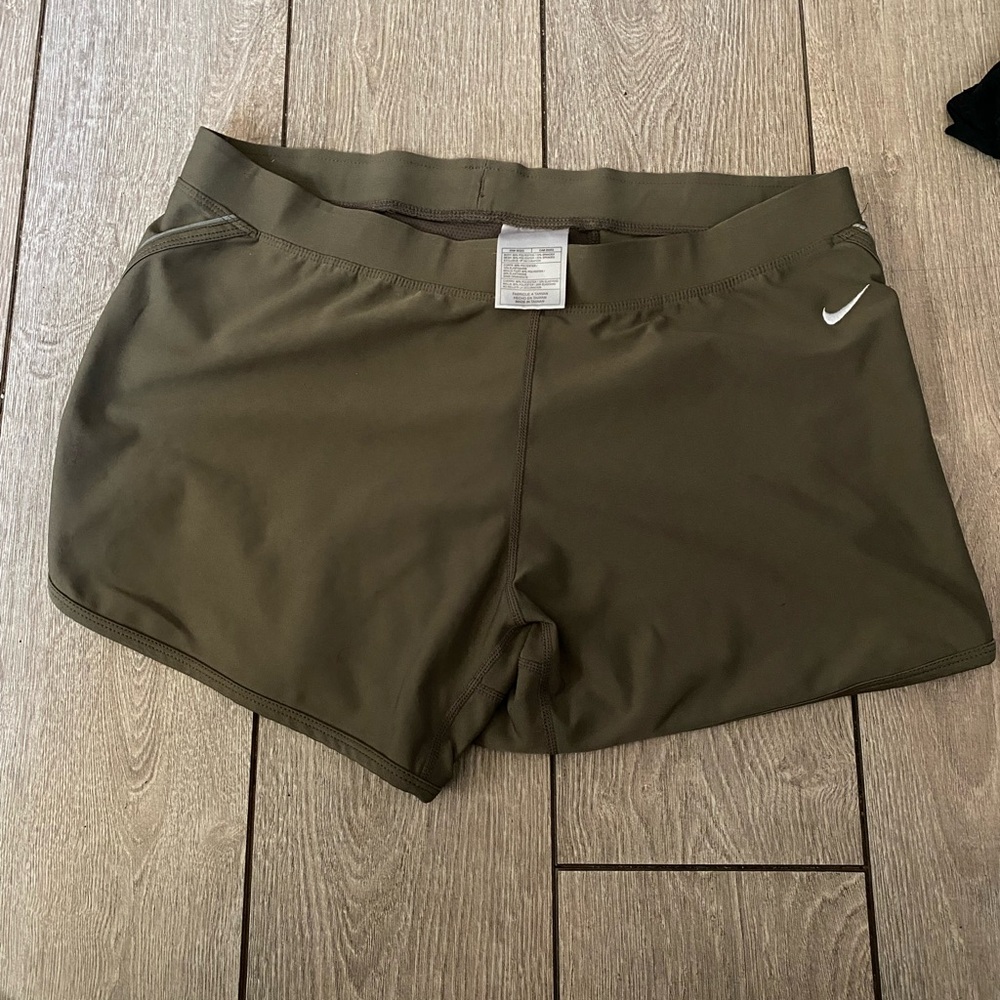 Nike Dri Fit Women’s lined running shorts size medium Olive green